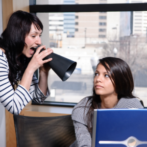 Woman talking to interpreter creating a distraction